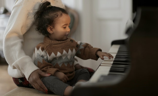child playing piano lessons.jpg