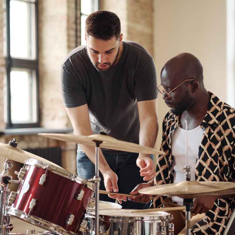 Adult learning to play drums in a private 1 on 1 drum lesson