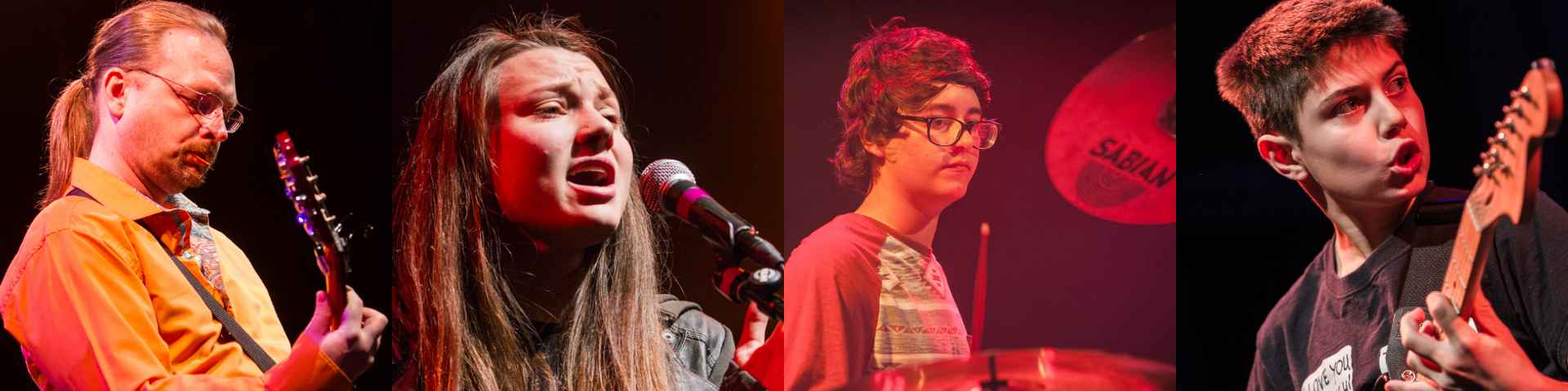 Students playing musical instruments on stage during performances at The Rock & Pop Music Academy